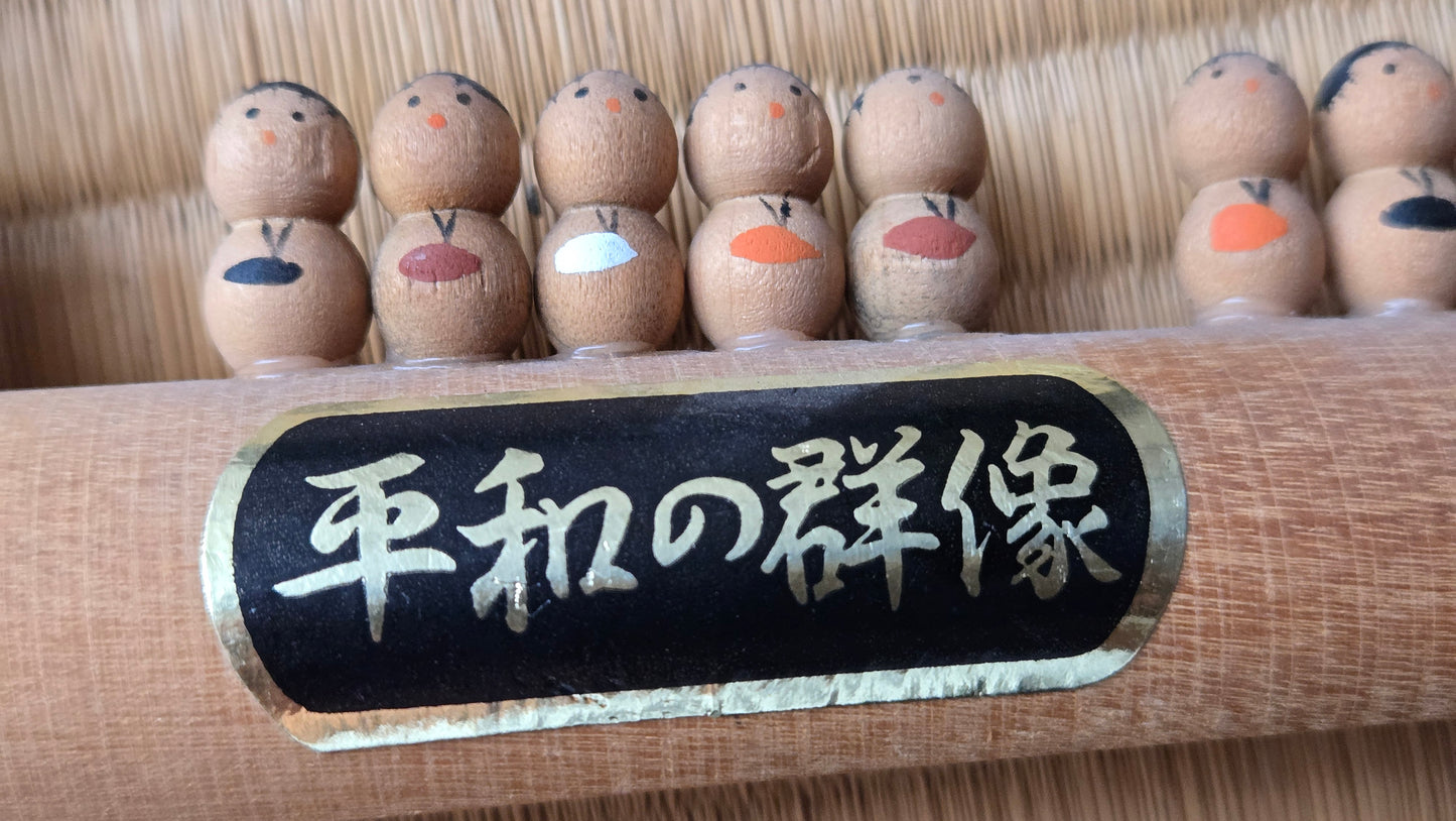 🖌️ Souvenir sculpté en forme de pinceau — "Heiwa no Gunzō" (平和の群像)